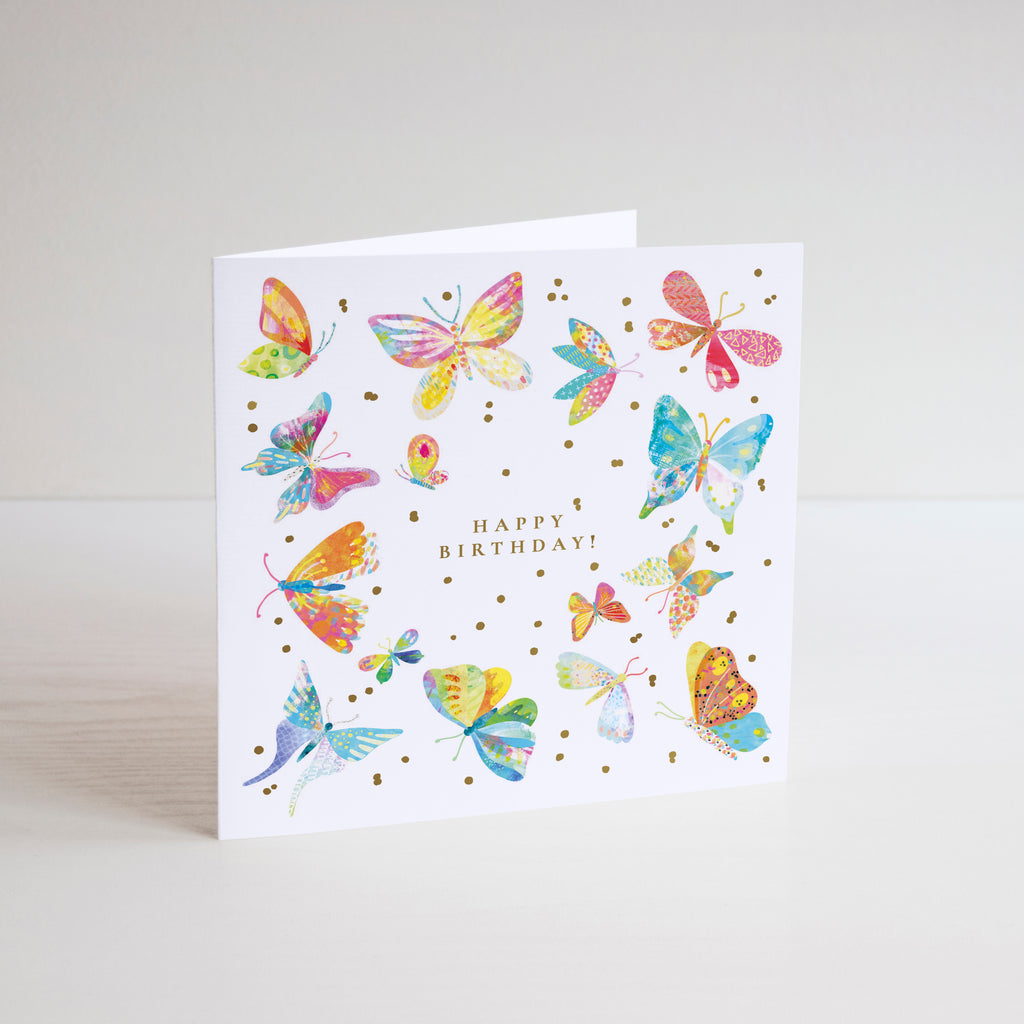    White, square Happy Birthday card with bright, colourful butterflies illustration.