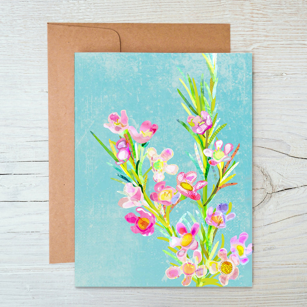 A6 Notecard with pink, purple, yellow and green wax flower illustration on light blue background.